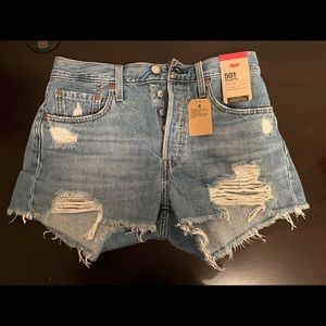 Levi light wash ripped shorts